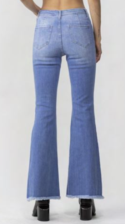 janis button fly bell bottom distressed jeans with unfinished hem - light wash denim