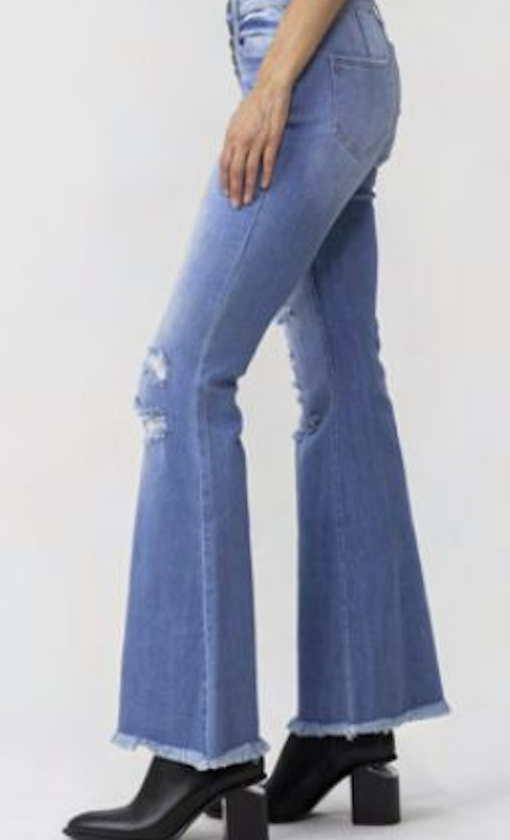 janis button fly bell bottom distressed jeans with unfinished hem - light wash denim